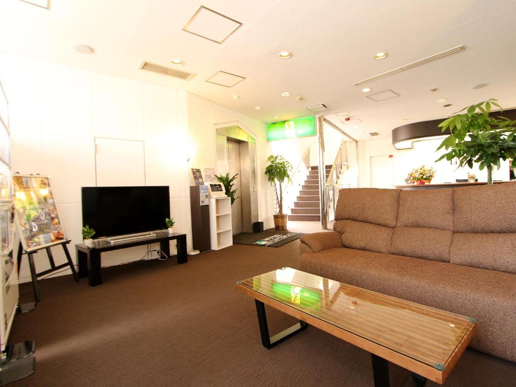 TV a/nebo společenská místnost v ubytování HOTEL LiVEMAX BUDGET Utsunomiya