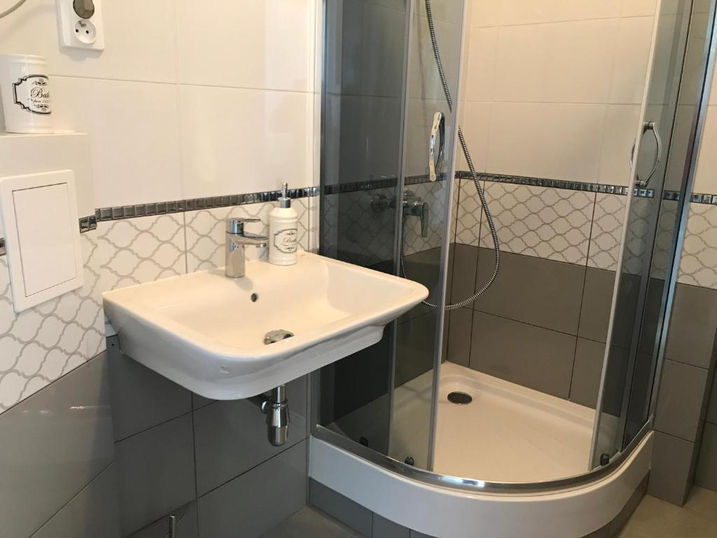 Kúpeľňa v ubytovaní Apartament Rodzinny S10