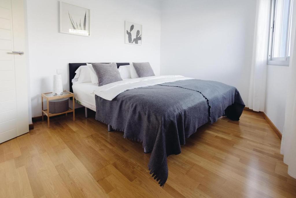 Un ou plusieurs lits dans un hébergement de l'établissement Cornisa Apartments