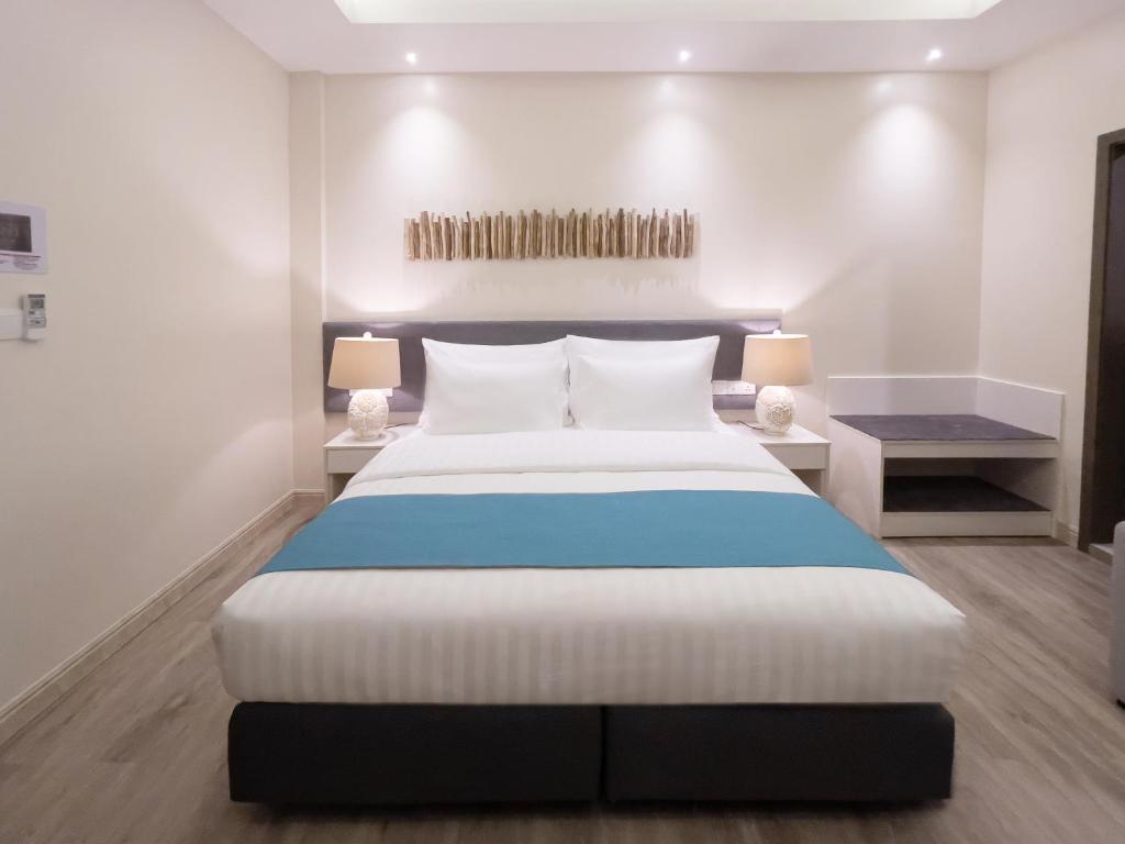 Postel nebo postele na pokoji v ubytování Sky Beach Maldives - Dhiffushi
