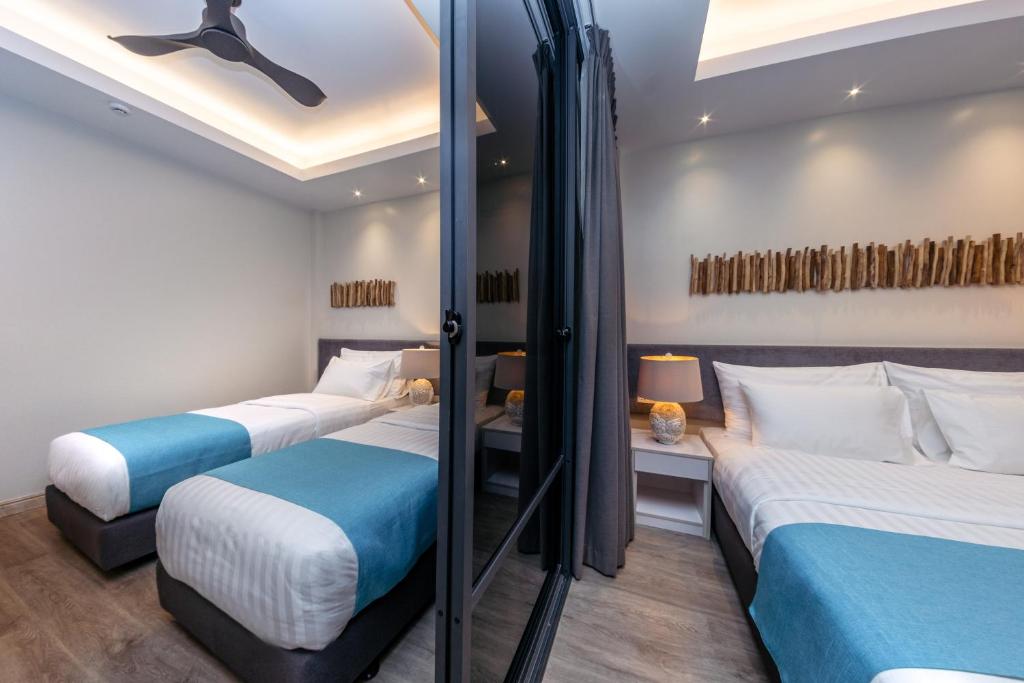 Postel nebo postele na pokoji v ubytování Sky Beach Maldives - Dhiffushi