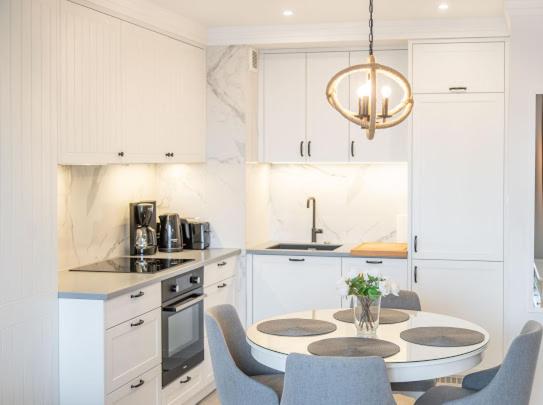Kuchyňa alebo kuchynka v ubytovaní Apartament Bliżej Morza Premium I