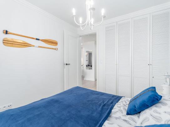 Posteľ alebo postele v izbe v ubytovaní Apartament Bliżej Morza Premium I