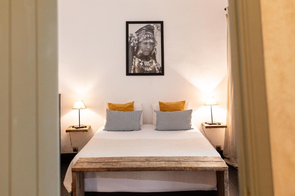 Uma cama ou camas num quarto em Riad Alia