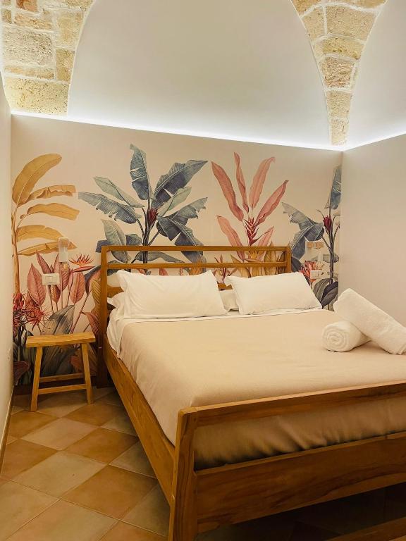 A bed or beds in a room at CASETTA CARENS nel centro storico di Nardò