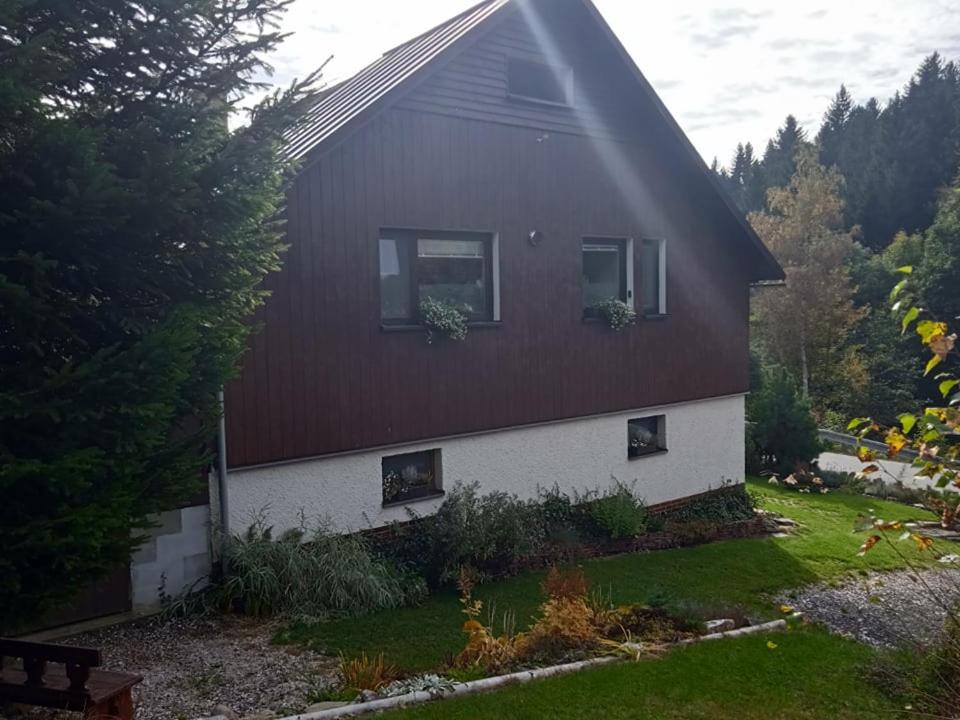 a house with two windows on the side of it at Chalupa Benecko-M.86 in Benecko