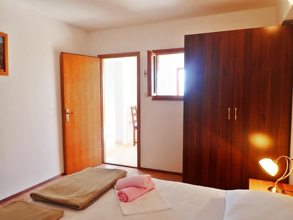 Posteľ alebo postele v izbe v ubytovaní Holiday Home Milovci