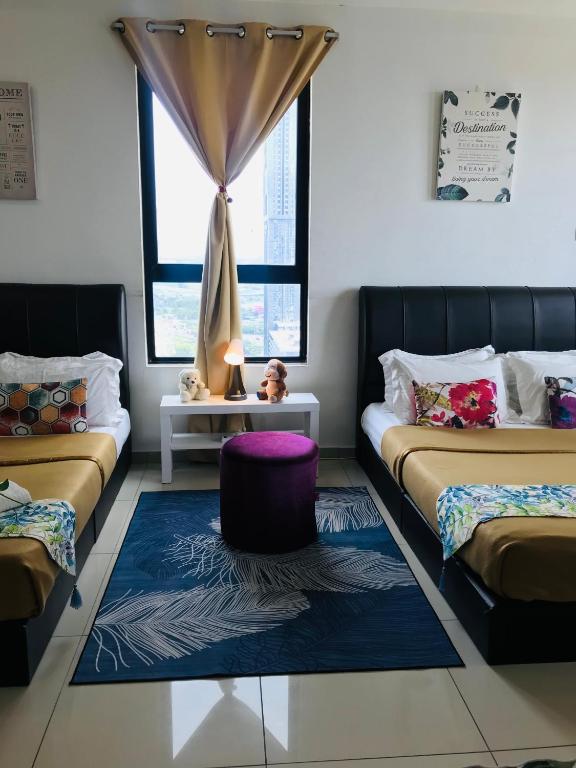 Postel nebo postele na pokoji v ubytování Studio I-Soho D'Gunduls Homestay by DGH I-CITY
