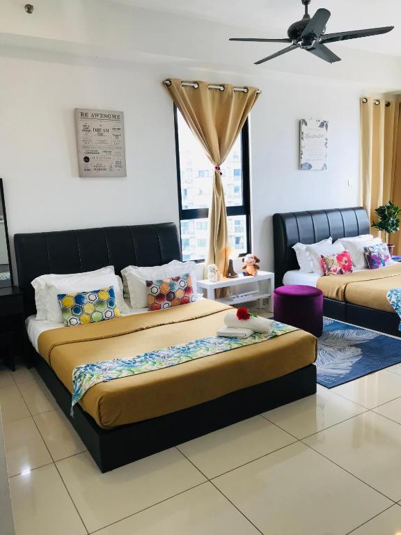 Postel nebo postele na pokoji v ubytování Studio I-Soho D'Gunduls Homestay by DGH I-CITY