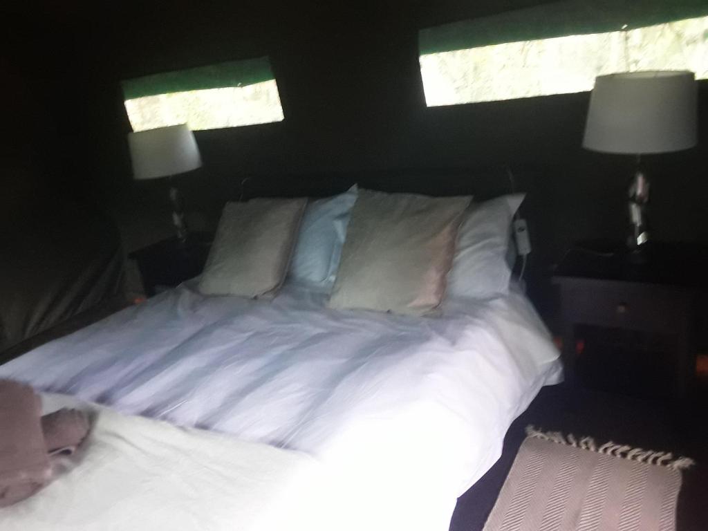 Postel nebo postele na pokoji v ubytování Otium Oasis Glamping & Camping