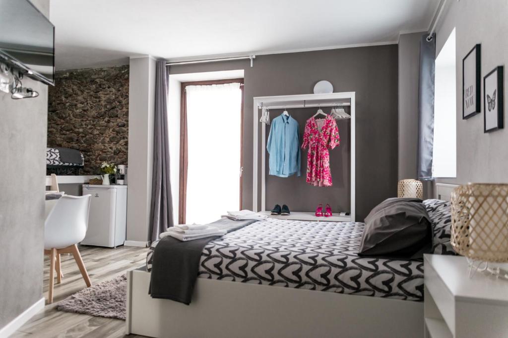 Letto o letti in una camera di Via Mazzini B & B (MXP)