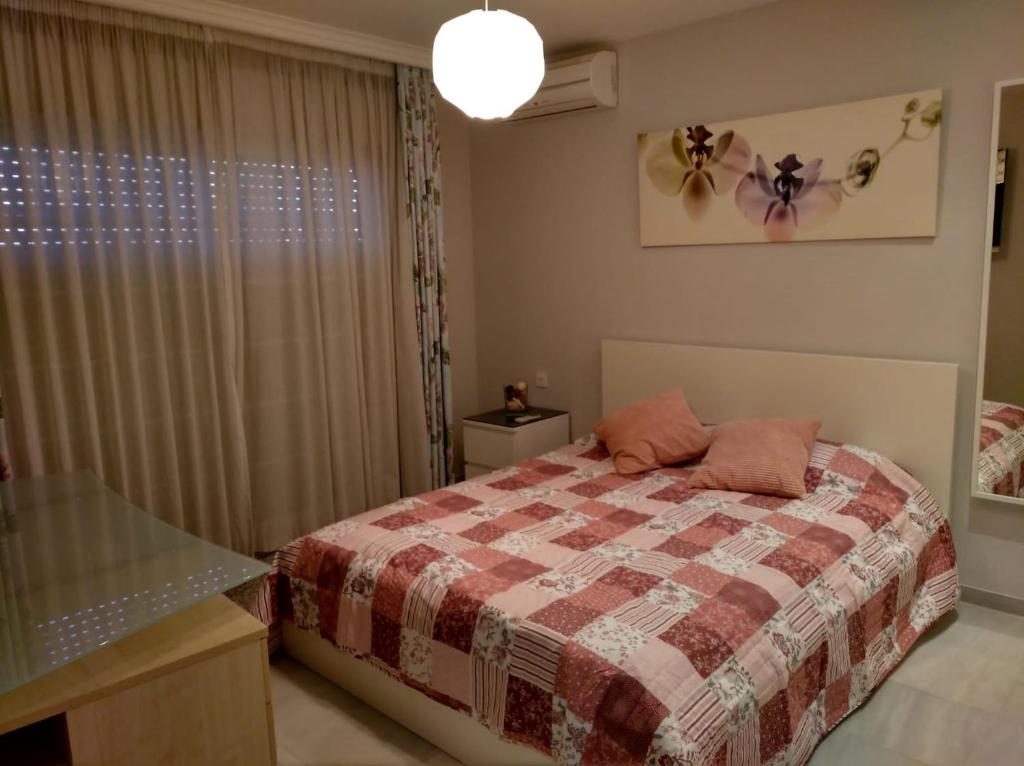 Posteľ alebo postele v izbe v ubytovaní Casa La Familia