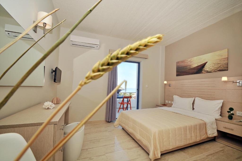 Posteľ alebo postele v izbe v ubytovaní Sirene Villas