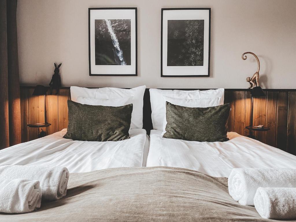 Postel nebo postele na pokoji v ubytování Siljansnäs Hotell