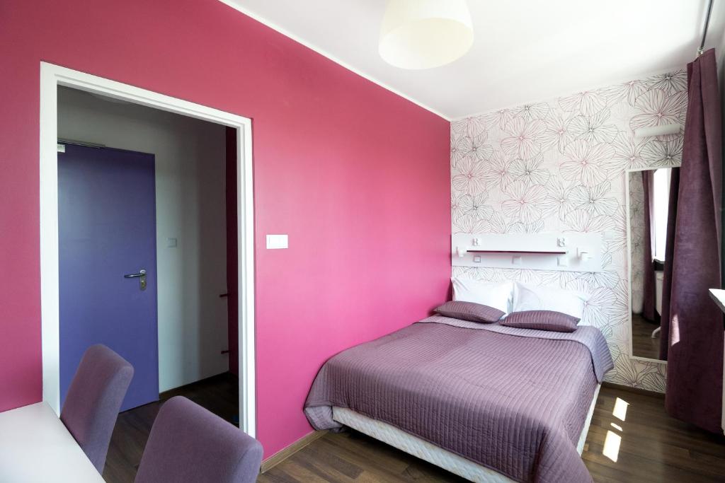 Posteľ alebo postele v izbe v ubytovaní Tatamka Hostel