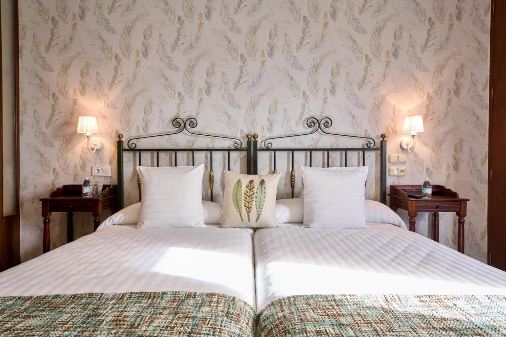 Postel nebo postele na pokoji v ubytování Lar da Mota Boutique Hotel