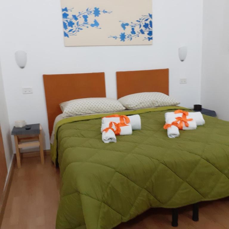 Postel nebo postele na pokoji v ubytování B&B Ciccio
