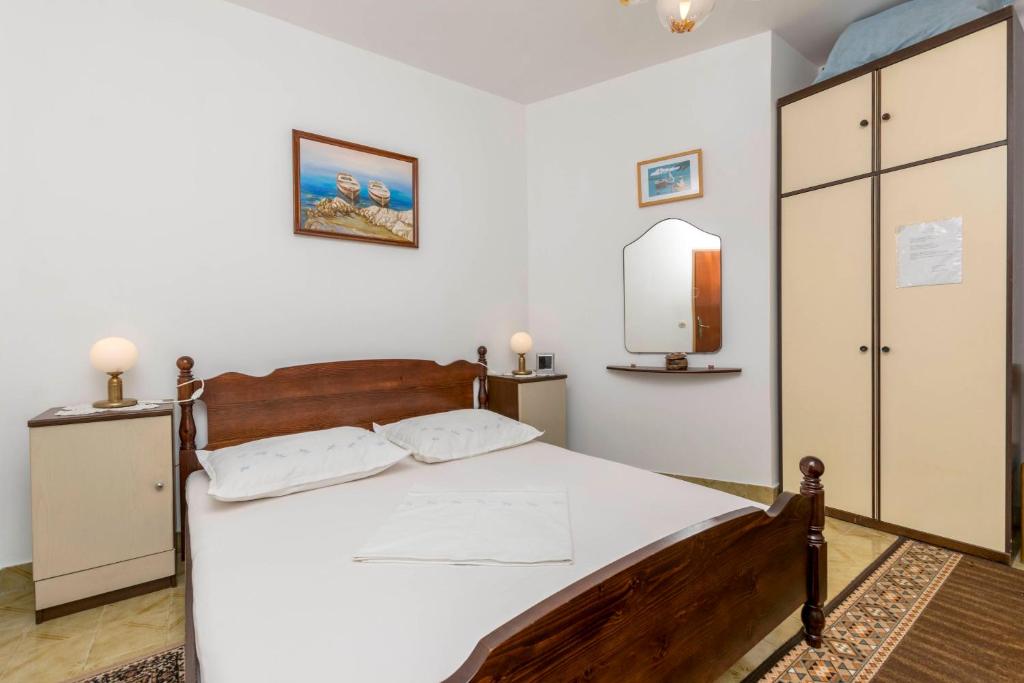 Posteľ alebo postele v izbe v ubytovaní Apartments Neno