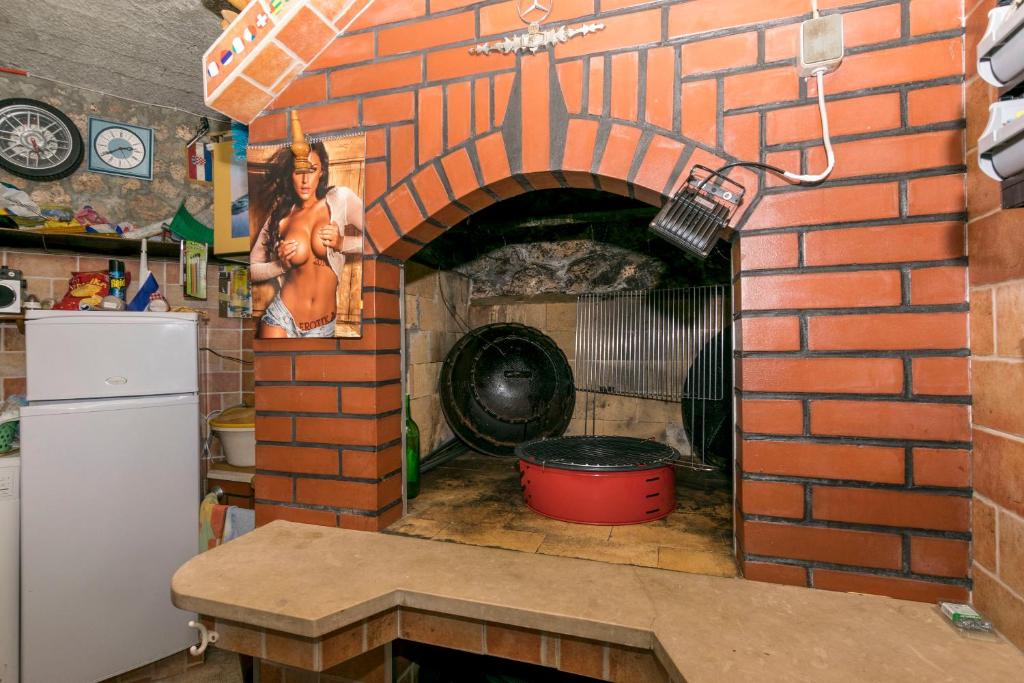 Kuchyňa alebo kuchynka v ubytovaní Apartments Neno