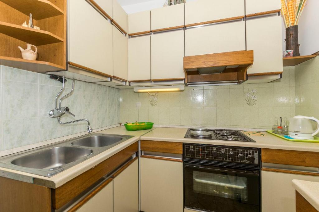 Kuchyňa alebo kuchynka v ubytovaní Apartments Neno