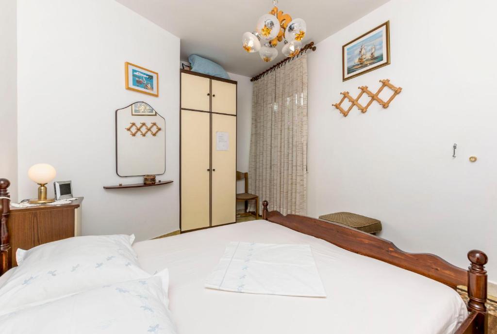 Posteľ alebo postele v izbe v ubytovaní Apartments Neno