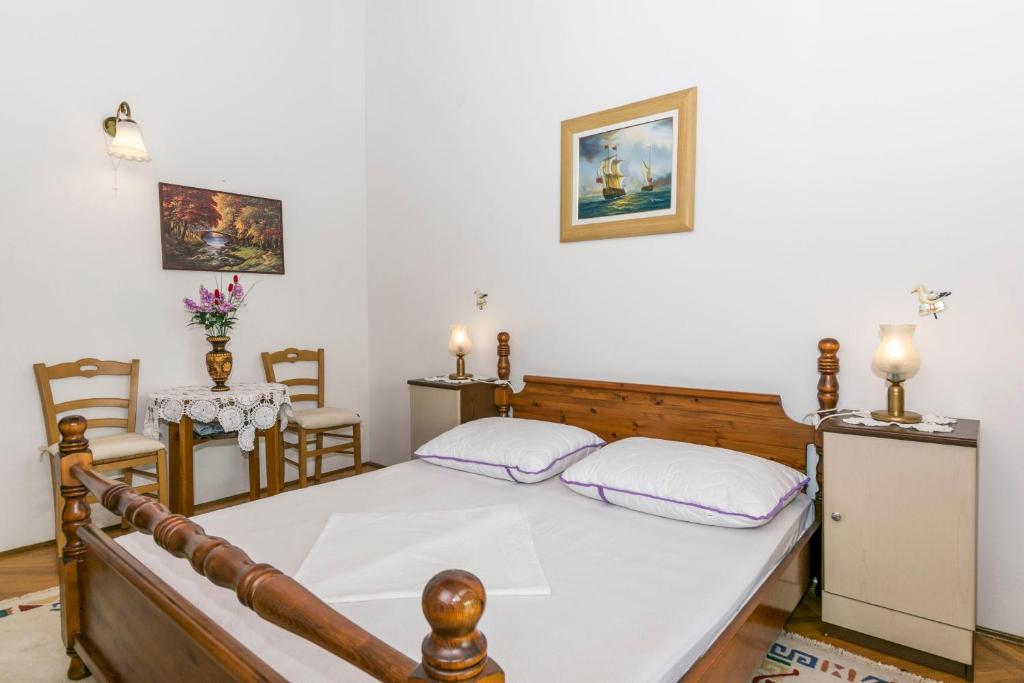 Posteľ alebo postele v izbe v ubytovaní Apartments Neno