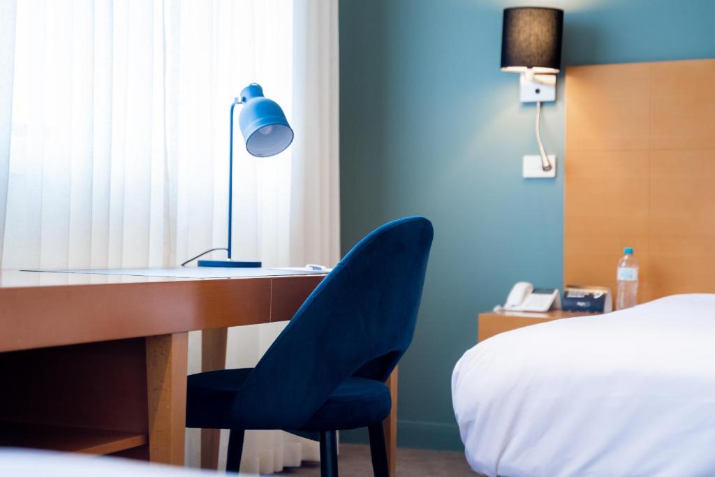 Postel nebo postele na pokoji v ubytování Gateway Hotel by Nightcap Plus