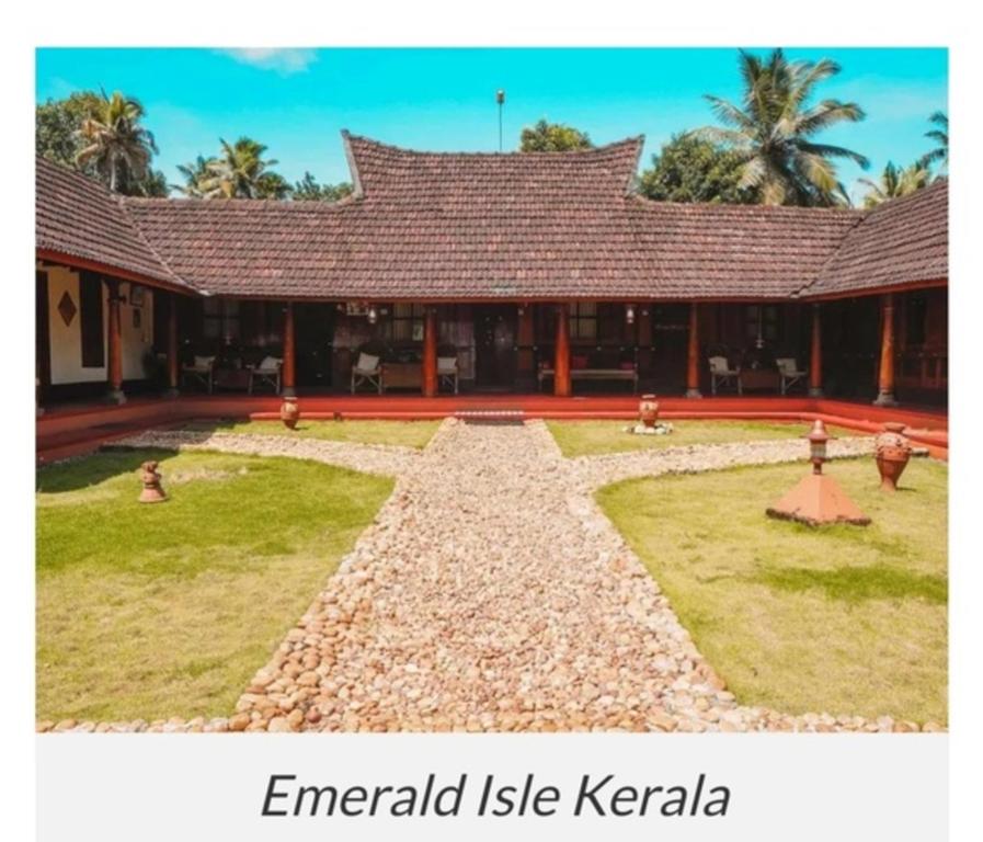 aninspired like kerala house with a garden at Emerald Isle in Alleppey
