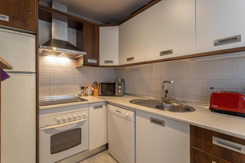 Kuchyňa alebo kuchynka v ubytovaní Apartamento Carla
