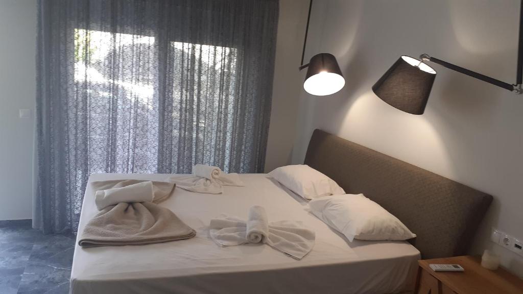 A bed or beds in a room at GIANNIS