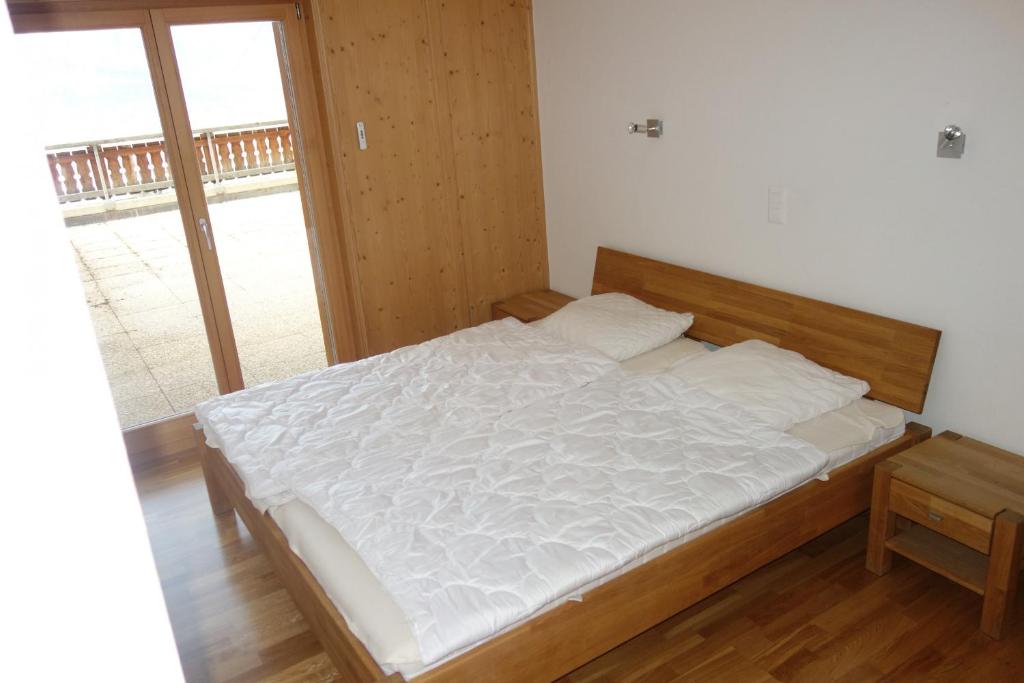 Postel nebo postele na pokoji v ubytování Hauts de Veysonnaz SAUNA & VIEW apartments