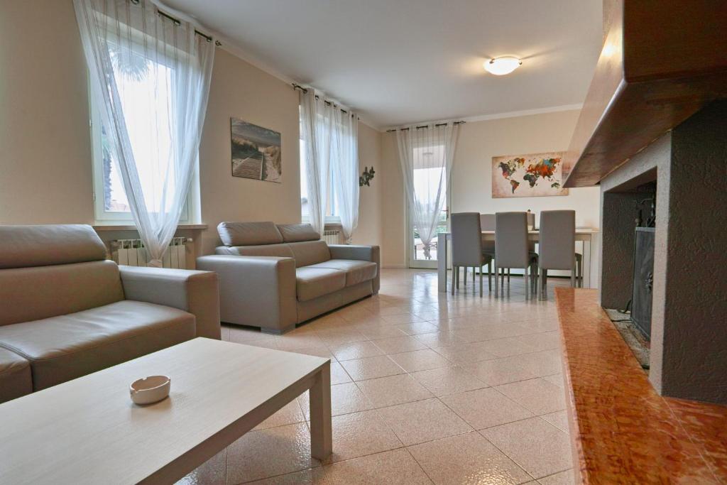Posedenie v ubytovaní Exclusive Villa le Palme