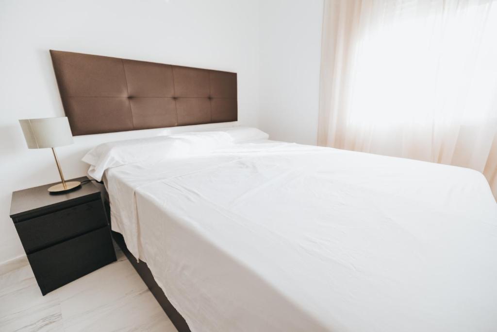 Posteľ alebo postele v izbe v ubytovaní Shiny Nab Super Family Apartment