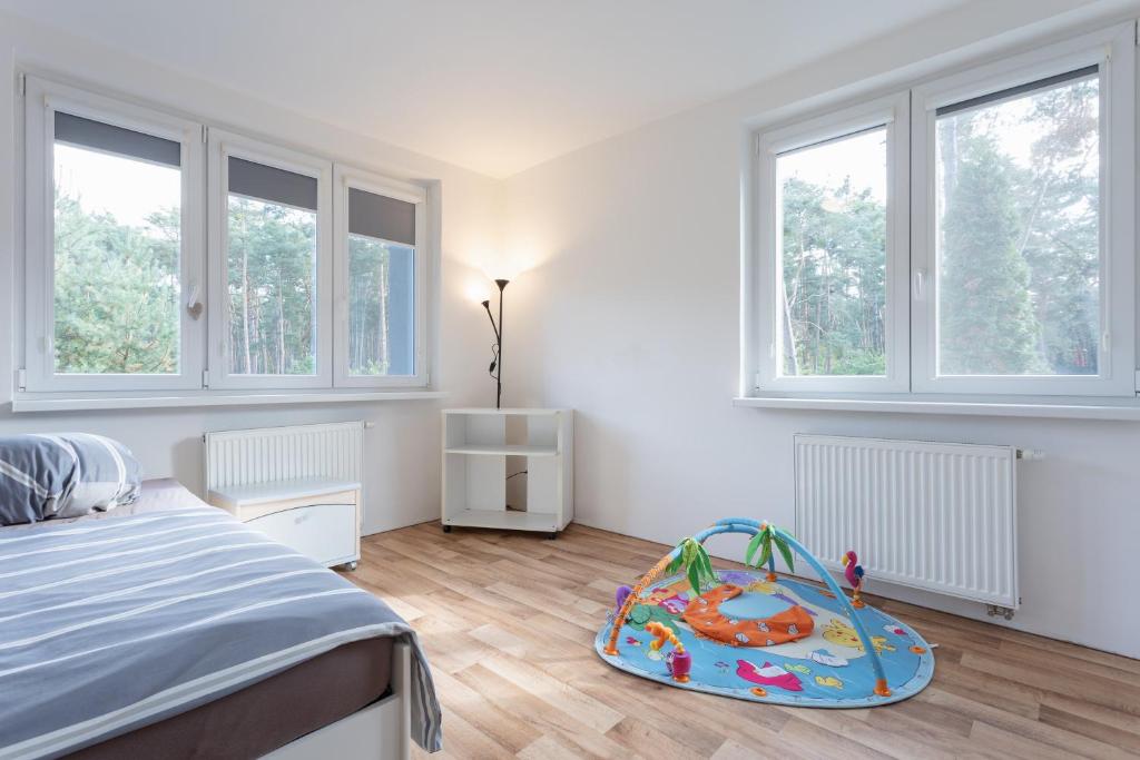 Postel nebo postele na pokoji v ubytování Villa Lhota