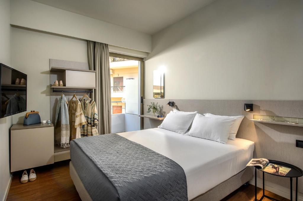 Postel nebo postele na pokoji v ubytování Marin Hotel