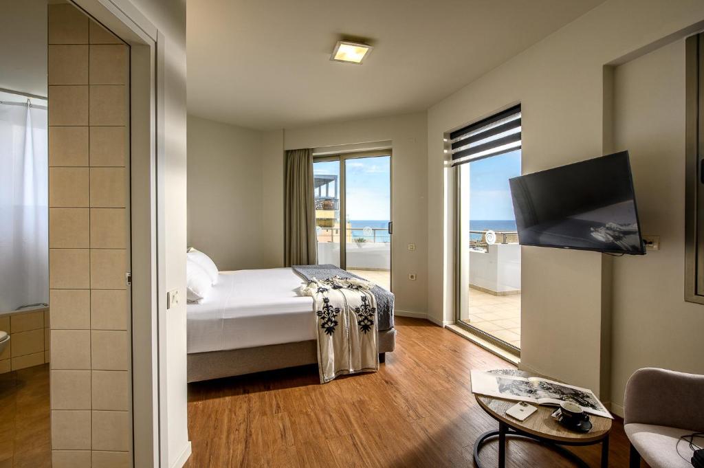 Postel nebo postele na pokoji v ubytování Marin Hotel