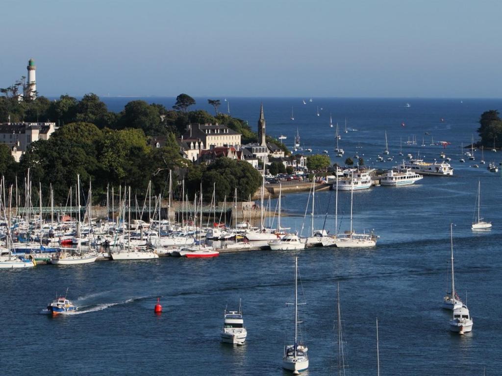 a bunch of boats are docked in a harbor at Résidence Ti An Amiral in Bénodet