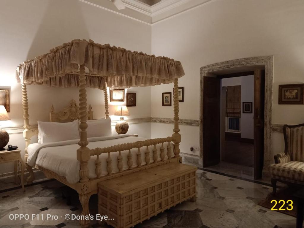 Postel nebo postele na pokoji v ubytování The Rajbari Bawali