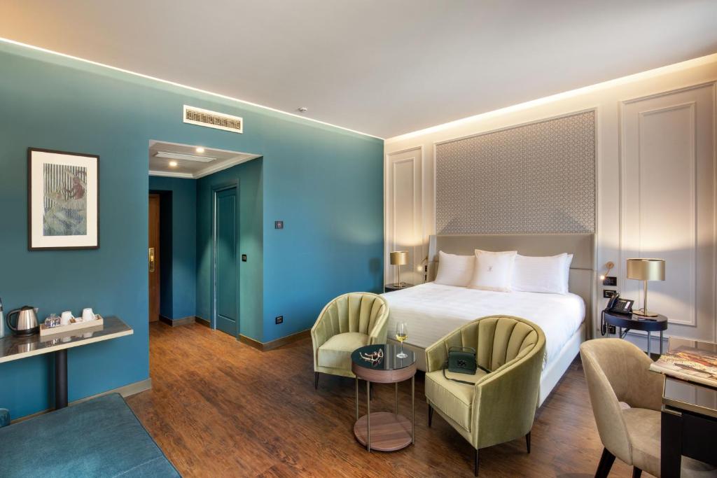 Postel nebo postele na pokoji v ubytování Hotel Niccolo' V - Terme dei Papi