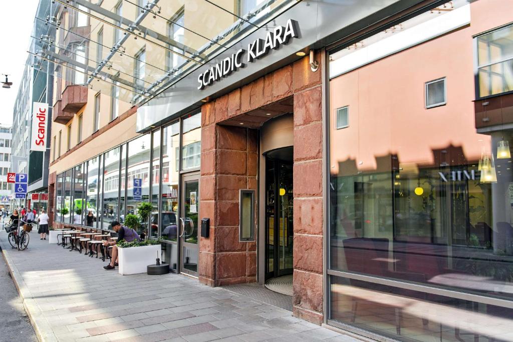 a store front of a building on a city street at Scandic Klara in Stockholm