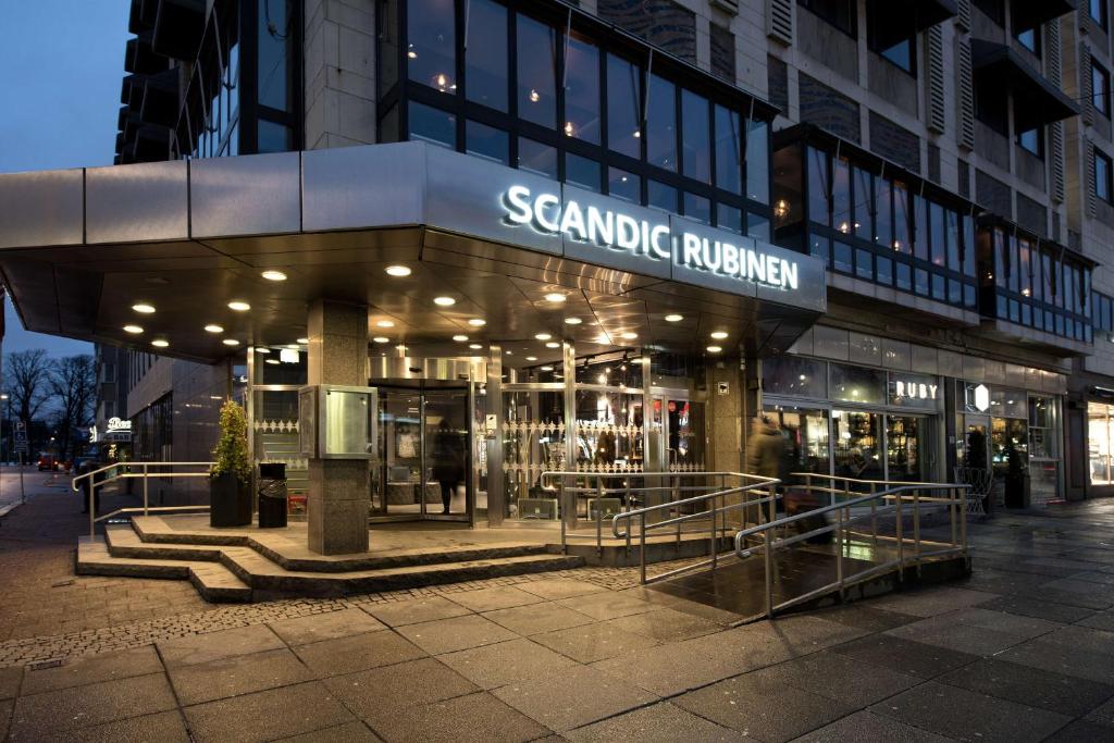 a building with a sign that reads granada international at Scandic Rubinen in Gothenburg