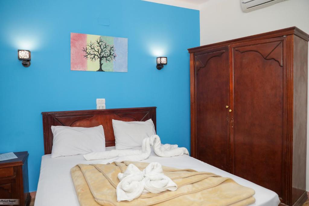 Postel nebo postele na pokoji v ubytování Carmine Hotel Dahab