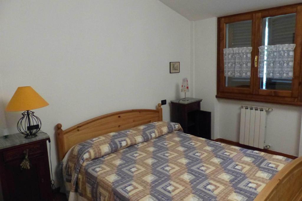 Postel nebo postele na pokoji v ubytování Arriga Alta