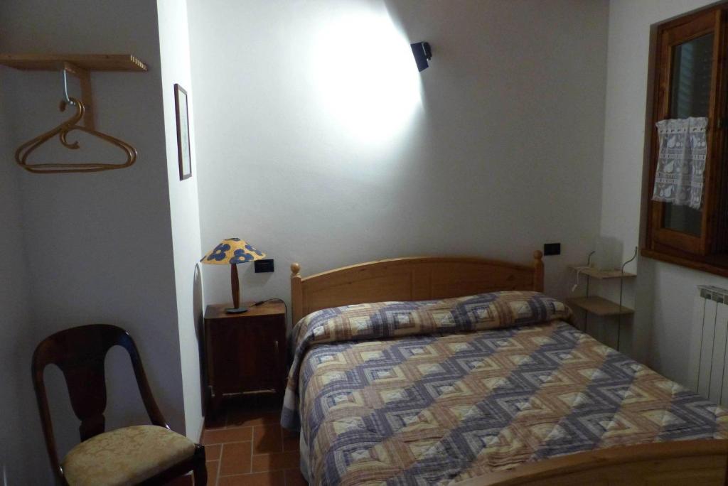 Postel nebo postele na pokoji v ubytování Arriga Alta
