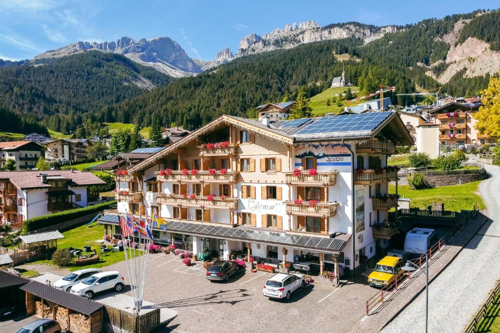 an aerial view of a hotel in the mountains at Berg Hotel Latemar Spitze in Vigo di Fassa