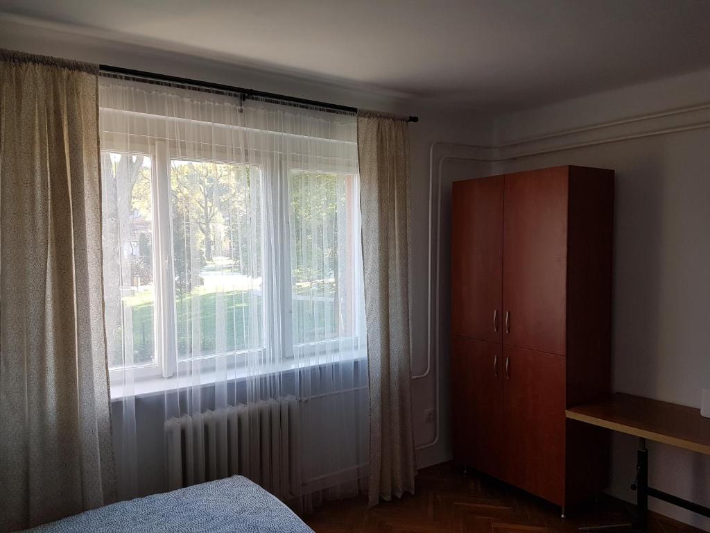 Posteľ alebo postele v izbe v ubytovaní Kuckó Apartman Berente