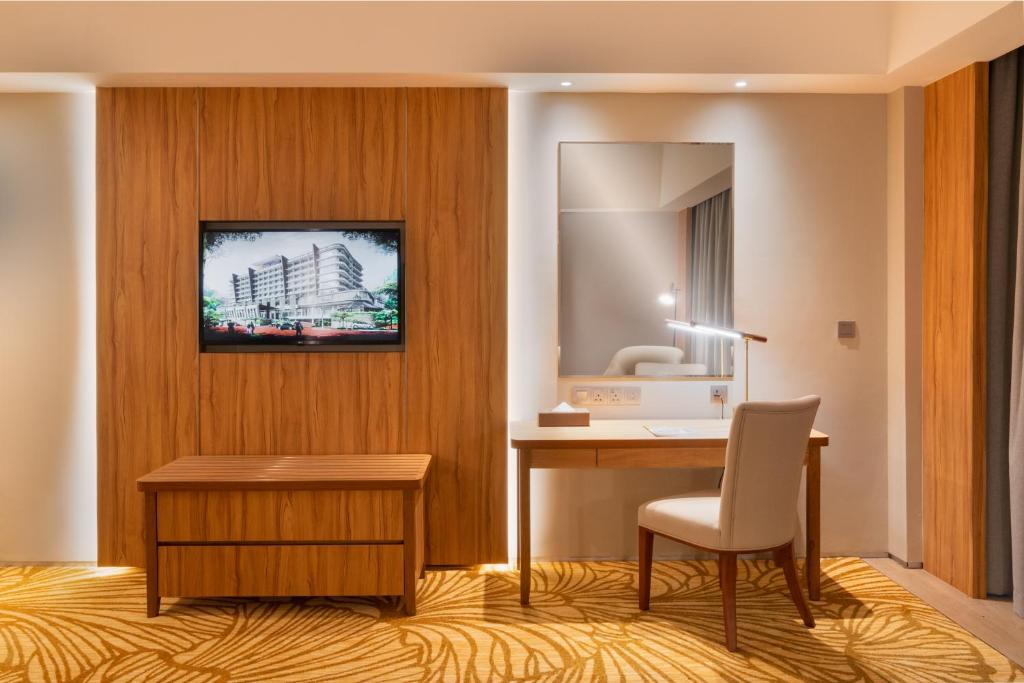 TV a/nebo společenská místnost v ubytování Zenith Hotel Cameron