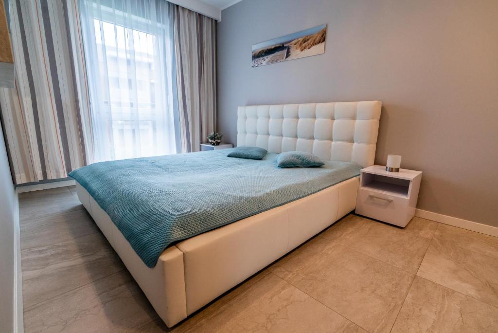 Posteľ alebo postele v izbe v ubytovaní Posejdon Gardenia Sun