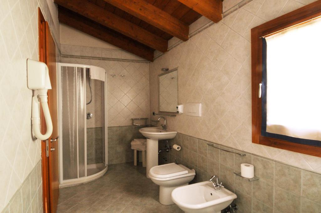 Kúpeľňa v ubytovaní Locanda Baraca