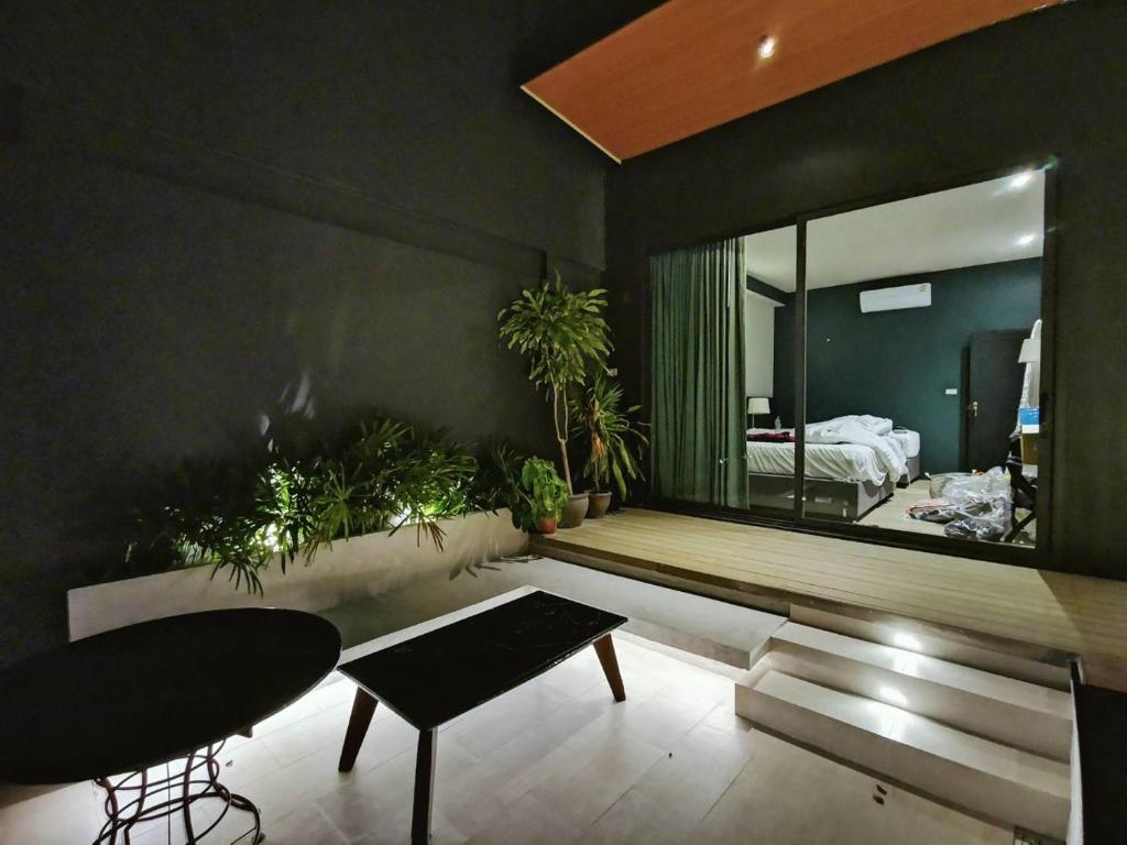 Postel nebo postele na pokoji v ubytování Dojo pool villa